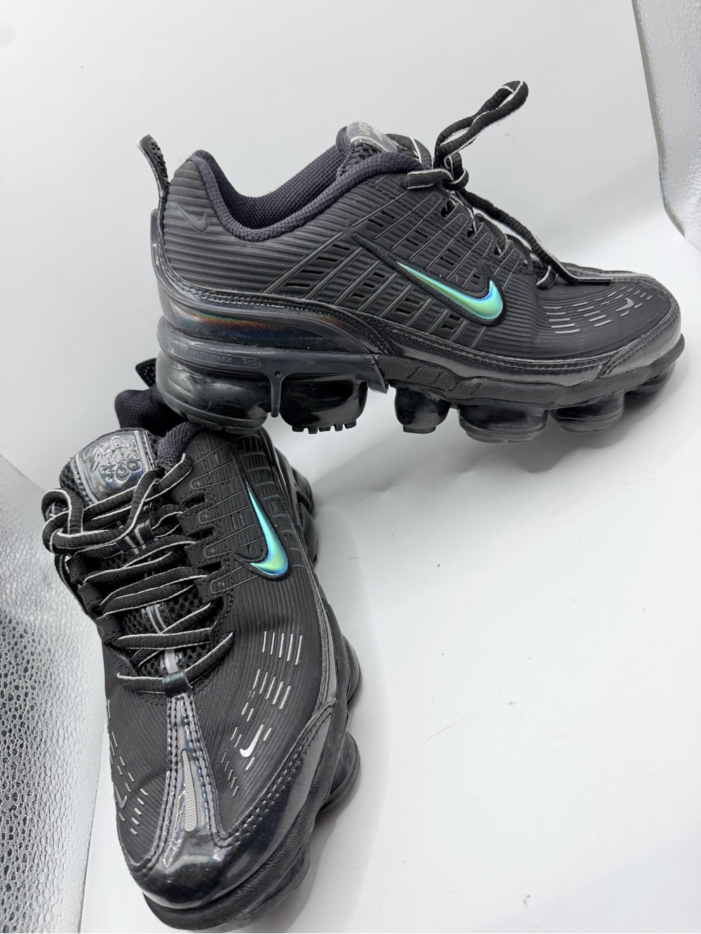 Nike Air Vapormax Black Sneakers with Iridescent Teal Swoosh